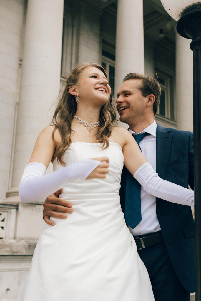 Couple laughing during Elopement at Shelby County Courthouse Memphis, TN