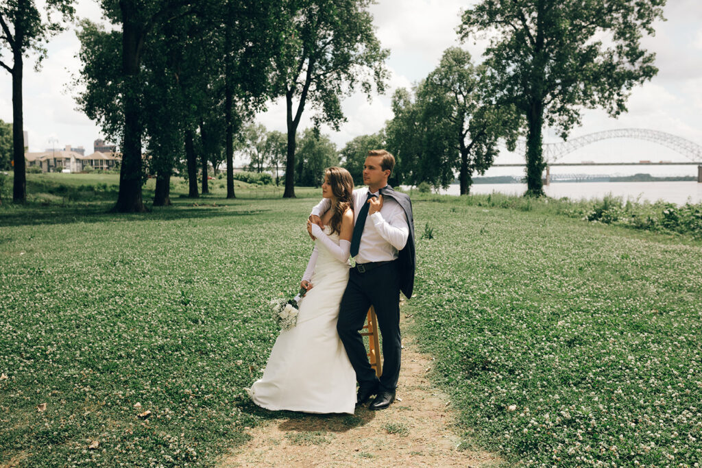 Couple cuddling near Mississippi River