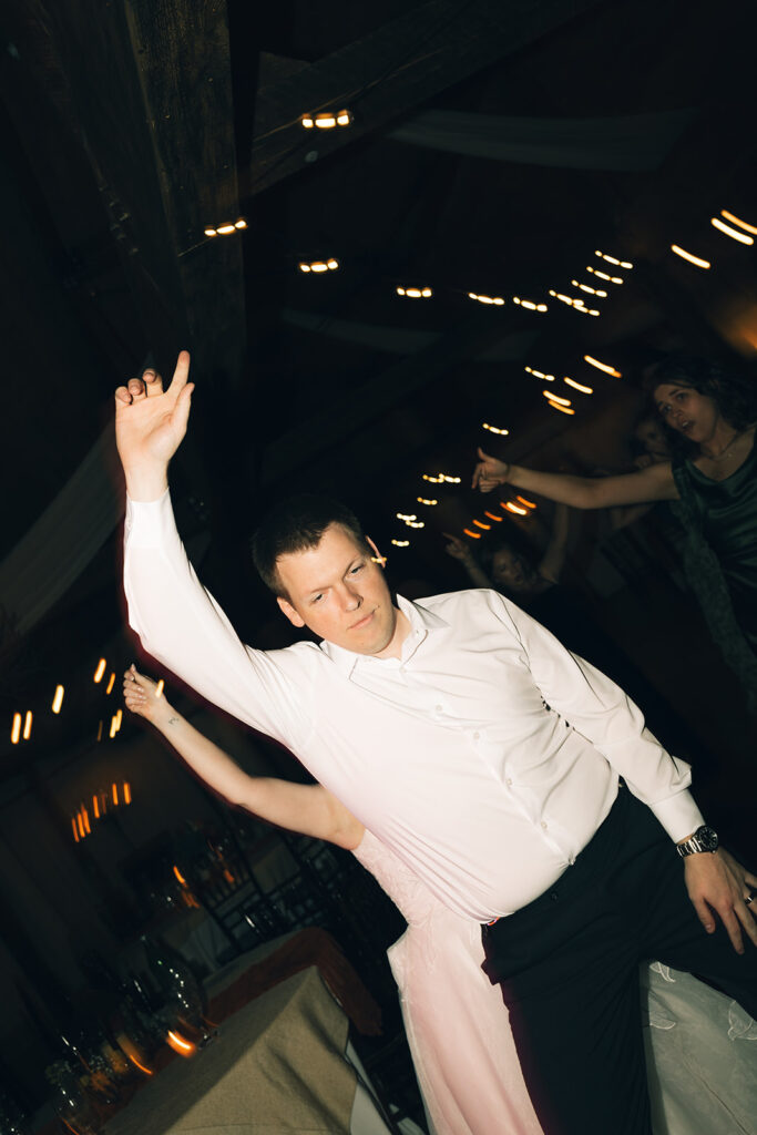 Dancing groom at Heartwood Hall wedding in Rossville, TN