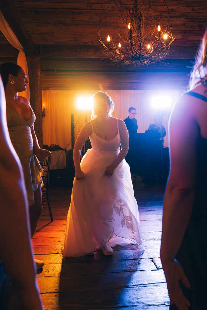 Dancing bride at Heartwood Hall wedding in Rossville, TN