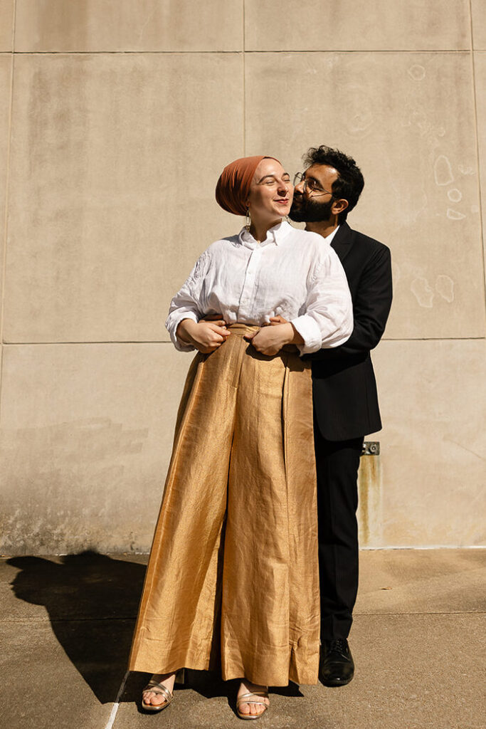 Interracial couple being affectionate for engagement photos